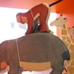 Figuren von Holztiger: Flusspferd, Affe, u.a.