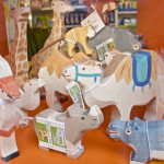 Figuren von Holztiger: Giraffe, Kamel, Gazelle, Nashorn, Flusspferd